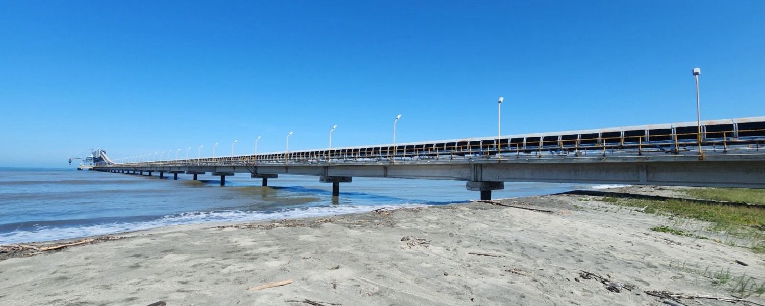 Imagen de referencia de un muelle carbonero a puerto multipropósito